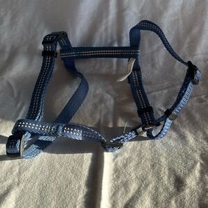 Adjustable blue dog harness - size small.